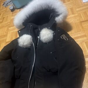 Moose Knuckles Black Jacket with Hockey Design
Size small